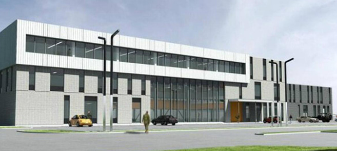 Vue aérienne d'un complexe institutionnel moderne en béton.